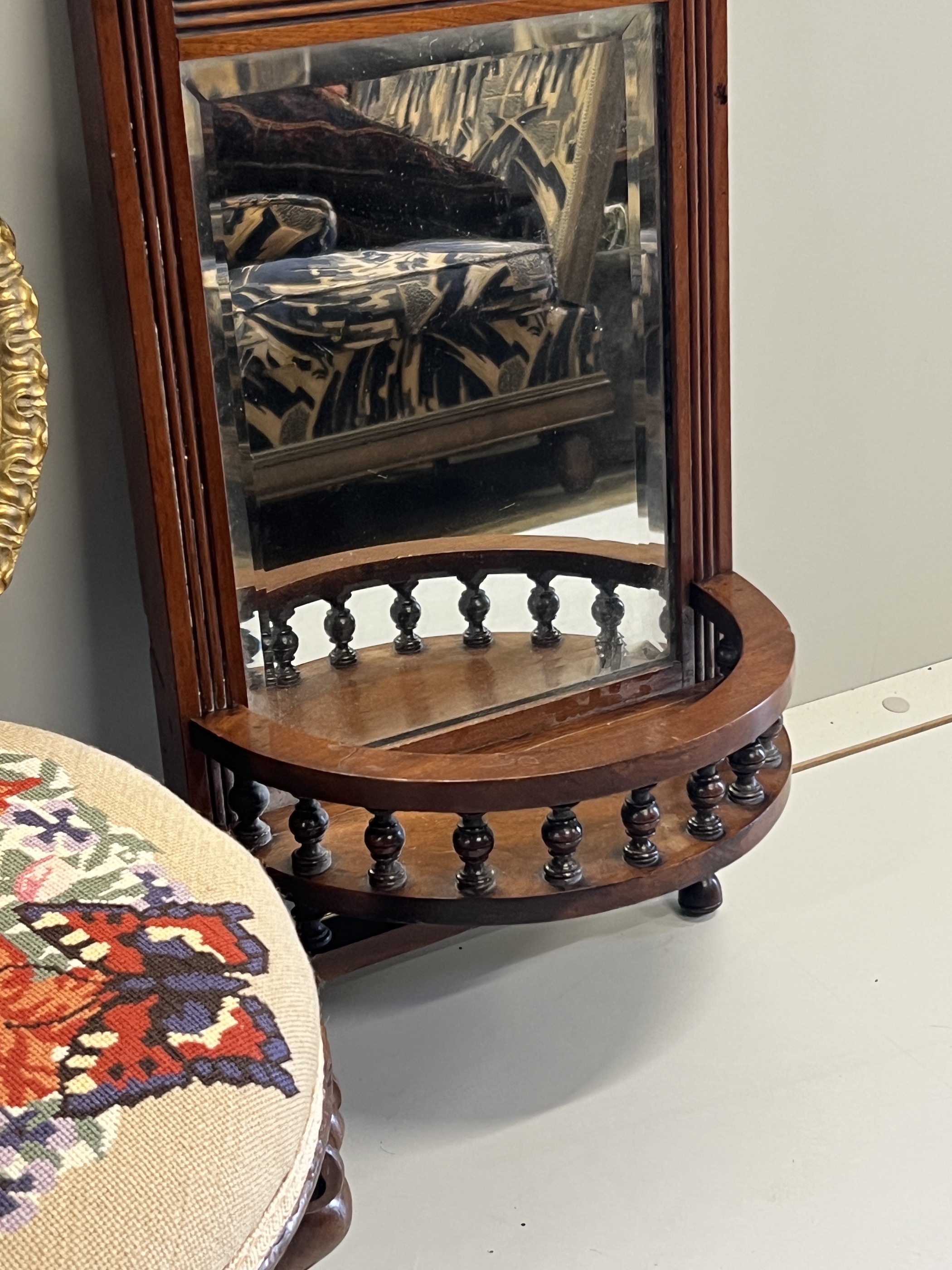 A late Victorian mahogany bowfront mirrored wall bracket, height 63cm, a Victorian circular footstool and a convex wall mirror